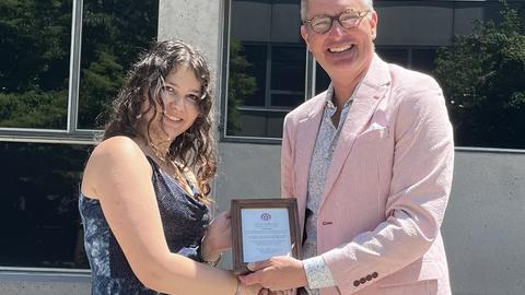 Larom Segev receives the Goldberg Prize from Dave Charbonneau